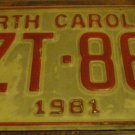 1981 XZT 860 North Carolina license plate with August 1988 stickers