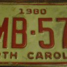 1980 WMB 579 North Carolina license plate with June 1985 stickers