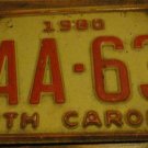 1980 WAA 636 North Carolina license plate with August 1985 stickers