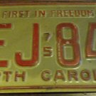 1975 LEJ 843 North Carolina license plate with 1980 sticker