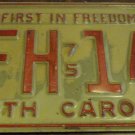 1975 CFH 142 North Carolina license plate with 1976 and August sticker