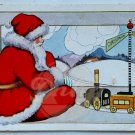 SANTA CLAUS Playing With Train Embossed Postcard No Postmark Made USA Vintage