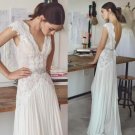 Boho Beach Wedding Dresses with Cap Sleeves V Neck Backless Pleated Skirt Elegan
