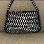 circa 1920 Vintage Black Evening Purse covered in prong-set Rhinestones