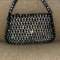 circa 1920 Vintage Black Evening Purse covered in prong-set Rhinestones