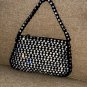 circa 1920 Vintage Black Evening Purse covered in prong-set Rhinestones