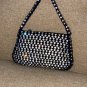 circa 1920 Vintage Black Evening Purse covered in prong-set Rhinestones