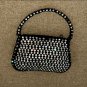 circa 1920 Vintage Black Evening Purse covered in prong-set Rhinestones
