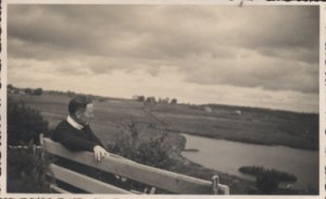 OLD PHOTO Postcard of Man on a Bench