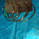 Three vintage pair of beautiful gold hoop earrings