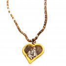 Vintage silver and gold Joseph and Jesus heart necklace.