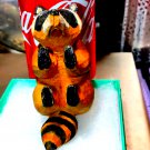 Extremely old antique wooden hand-carved raccoon