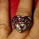 Adjustable vintage silver heart ring with purple rhinestones.