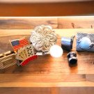 Single vintage cufflinks and American flag lapel pin