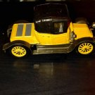 Black and yellow old-timey Corgi classic car