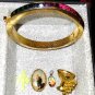 Vintage religious items and vintage multicolor multi-rhinestone gold clamp brace
