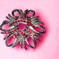 High-end vintage brooch with Ruby colored stones~extremely gorgeous