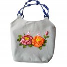 women Handbag. made of denim fabric, shaped with ribbons. height 13,width 14