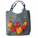 women Handbag. made of denim fabric, shaped with ribbons. height 13,width 14