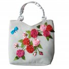 women Handbag. made of denim fabric, shaped with ribbons. height 13,width 14