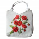 women Handbag. made of denim fabric, shaped with ribbons. height 13,width 14