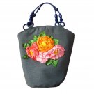 women Handbag. made of denim fabric, shaped with ribbons.
