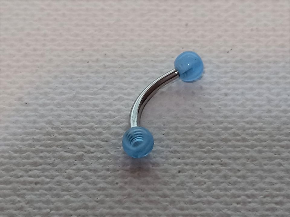 Curved Barbell Eyebrow Ring.