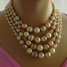 Vintage Necklace Japan cream brown tan iridescent bead Four strand oval bead necklace  No. 108