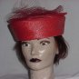 Red polystraw church pillbox hat net frou on back. No. 144