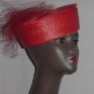 Red polystraw church pillbox hat net frou on back. No. 144