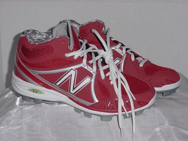 red and white new balance cleats