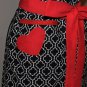 Stylish Patterned Apron with a Heart Pocket and a Touch of Red with Ruffles