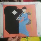Vintage primitive paper painting for a girl playing piano