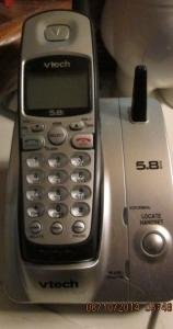 Two cordless phones with units