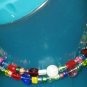 Golden lock and key on rainbow walk memory wire bracelet
