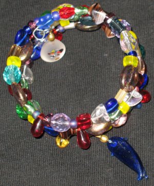 New age blue dolphin treasures--a memory wire bracelet