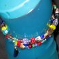 New age blue dolphin treasures--a memory wire bracelet