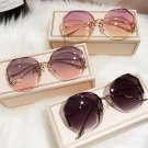 Luxury Round Gradient Sunglasses Women Metal Curved Temples Eyewear Ocean Rimless