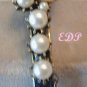 Florenza Gold Tone Faux Pearl Bangle Bracelet Designer