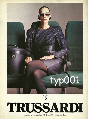 TRUSSARDI - 1987 A PLANE A WOMAN A BAG ALL DRESSED BY THE SAME STYLIST PRINT AD