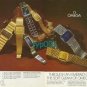 OMEGA - 1973 - THROUGH AN EMERALD CUT CRYSTAL SOFT GLEAM OF PRECISION PRINT AD