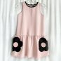 Mini dres for girl or young teenager, light pink with black accents. Size M
