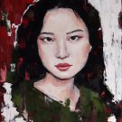 Asian woman in green dress