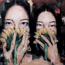 Asian women with sunflowers