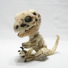 WowWee Untamed Skeleton Raptor by Fingerlings Gloom Dinosaur Glow In The Dark