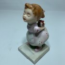 Kissing Girl Figurine with Gift Bisque Porcelain Vintage Cute Child