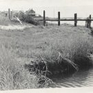 Vintage B&W Photo Cape Cod Grassy Shoreline Dock Homes Motor Boat 5” x 3.5”
