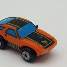 Small Micro Machine Plastic Porsche 928 in Orange with Black trim