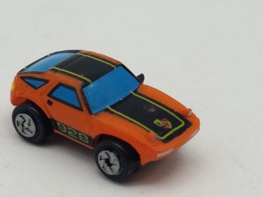 Small Micro Machine Plastic Porsche 928 in Orange with Black trim