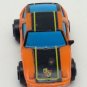 Small Micro Machine Plastic Porsche 928 in Orange with Black trim